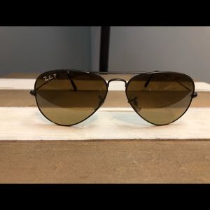 Black Ray Ban polarized aviators.